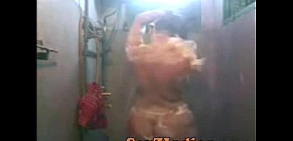  993451 thick indian slut wife films herself bathing